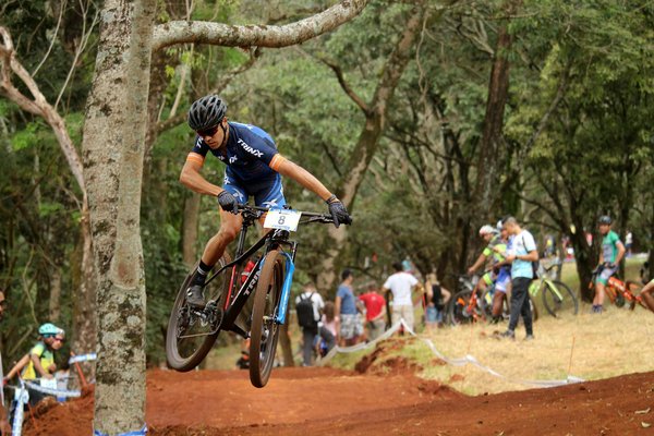 What are the economic benefits of investing in niche sports in the UK?